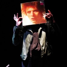 WHILE MY GUITAR GENTLY WEEPS